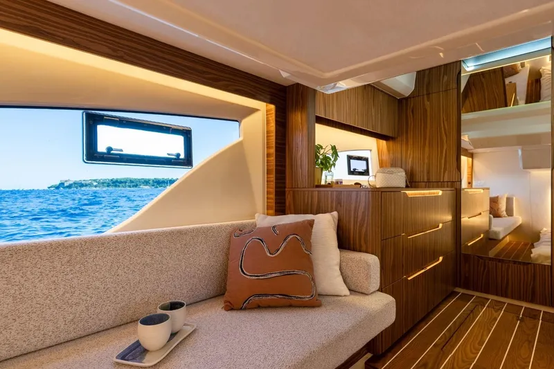  Yacht Photos Pics Luxurious Marex 390 yacht interior with elegant wood finish and ocean view, 2026 model.