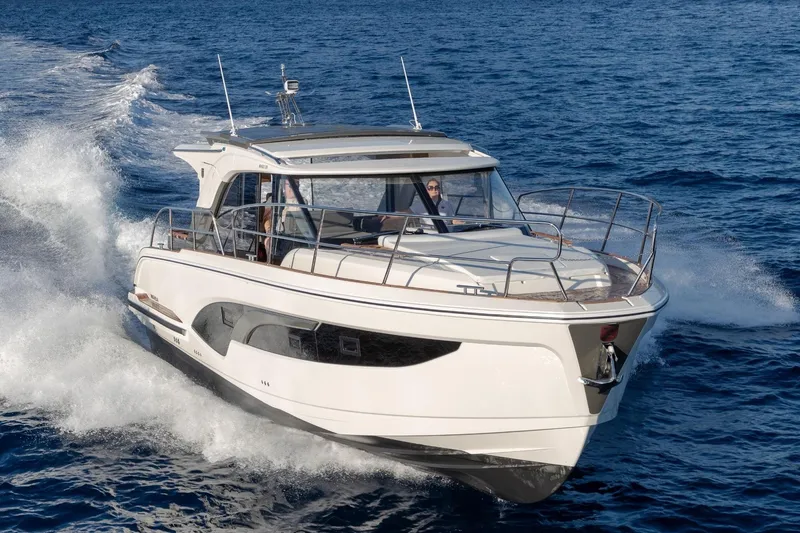  Yacht Photos Pics 2026 Marex 390 yacht cruising on open sea, showcasing sleek design and performance.