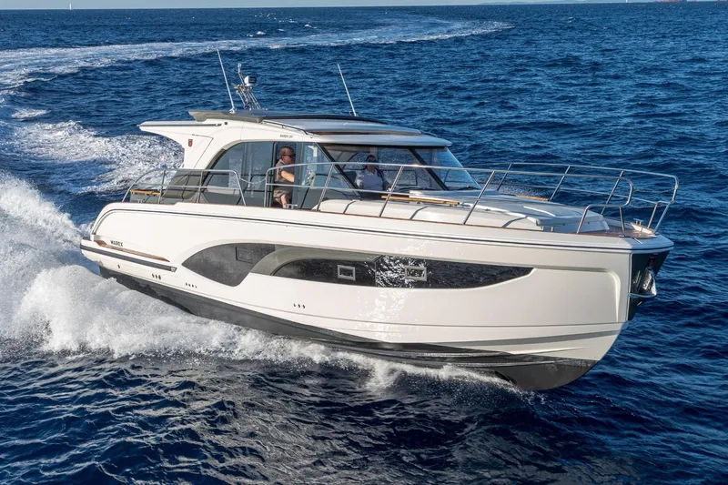  Yacht Photos Pics 2026 Marex 390 yacht cruising on open sea, showcasing sleek design and performance.