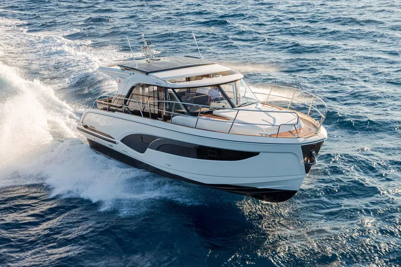  Yacht Photos Pics 2026 Marex 390 yacht cruising on open sea, showcasing sleek design and performance.