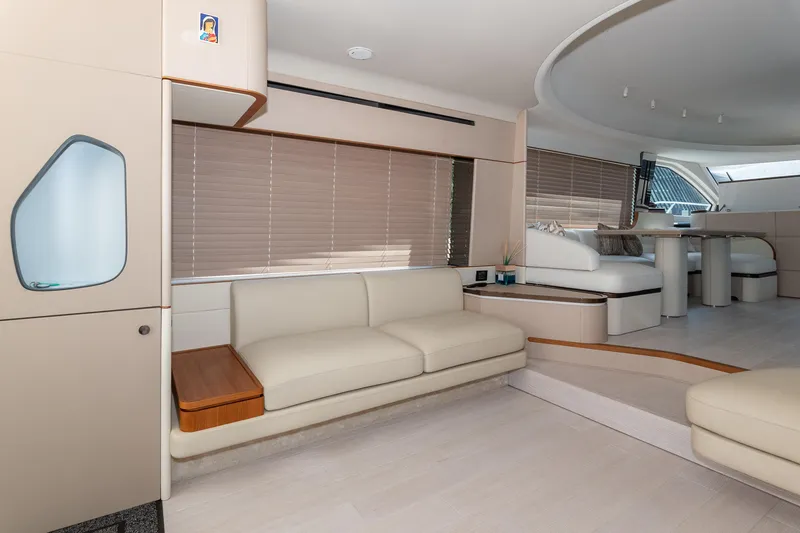  Yacht Photos Pics Luxurious interior of 2024 Azimut 68 yacht with modern seating and elegant design.