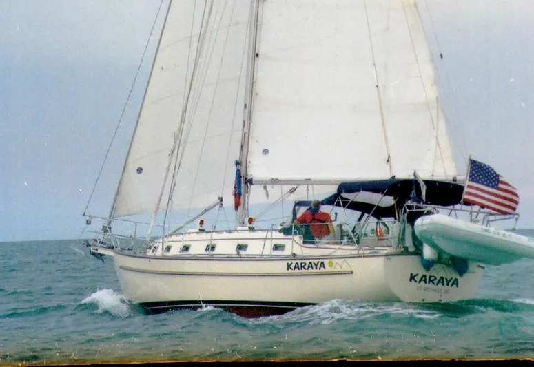 Karaya Yacht Photos Pics Sailing yacht "Karaya," Island Packet 40, 1995 model, cruising on open water.