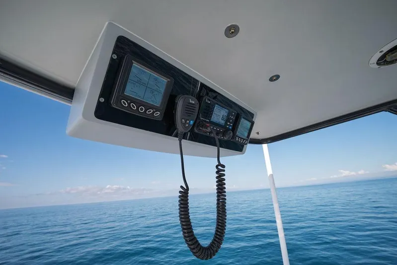 Chunda Yacht Photos Pics Boat electronics on Merritt 48, 1998 model, with ocean view in background.