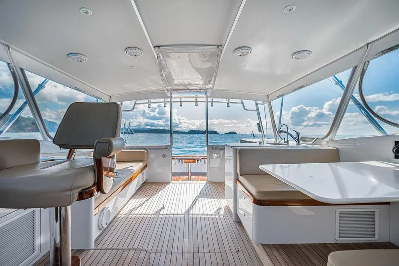 Chunda Yacht Photos Pics Luxurious interior of a 1998 Merritt 48 yacht with ocean view.