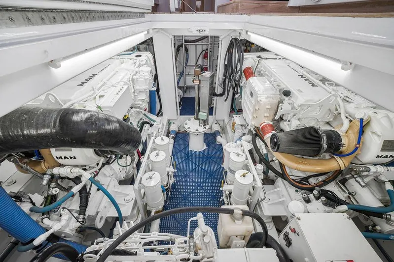 Chunda Yacht Photos Pics Engine room of a 1998 Merritt 48 yacht, featuring dual MAN engines.