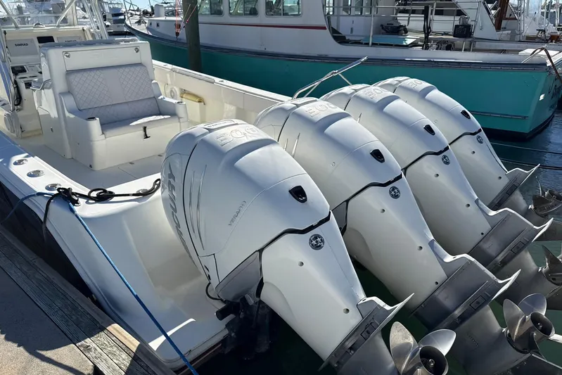 Showtime Yacht Photos Pics 2015 SeaVee 390Z boat with four powerful outboard engines docked at marina.