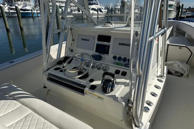 Showtime Yacht Photos Pics 2015 SeaVee 390Z boat console with Simrad electronics, docked at marina.