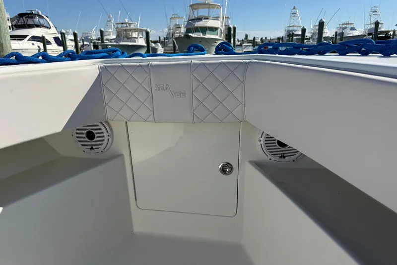 Showtime Yacht Photos Pics 2015 SeaVee 390Z boat interior with speakers and storage compartment.