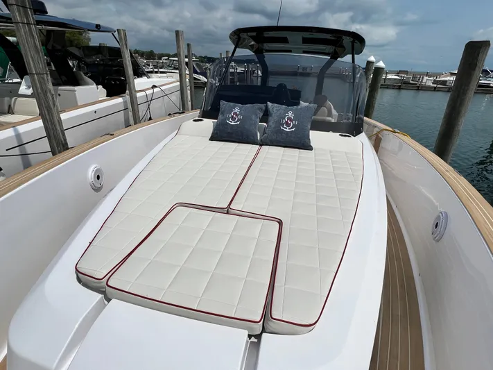  Yacht Photos Pics 2023 Pardo Yachts 38 Outboard with spacious sunbed and elegant design at marina.