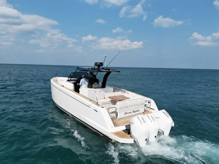  Yacht Photos Pics 2023 Pardo Yachts 38 Outboard cruising on open sea under clear blue sky.