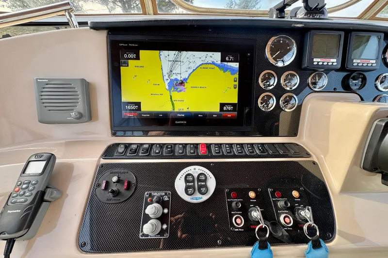Water Music Yacht Photos Pics Dashboard of a 2006 Carver 43 Motor Yacht with navigation and control systems.