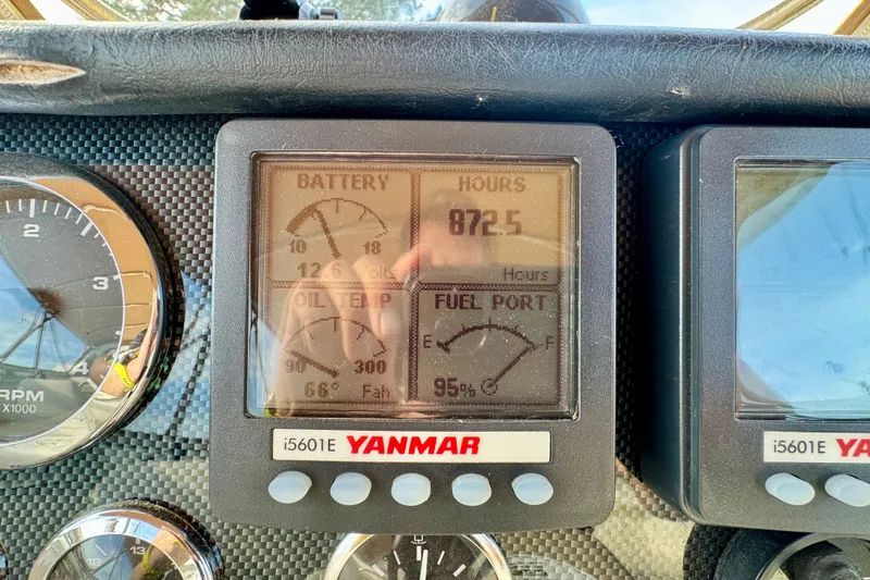 Water Music Yacht Photos Pics Dashboard of 2006 Carver 43 Motor Yacht showing Yanmar engine gauges.