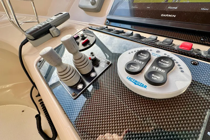 Water Music Yacht Photos Pics Control panel of a 2006 Carver 43 Motor Yacht with Garmin navigation system.