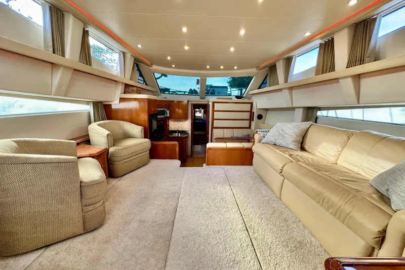 Water Music Yacht Photos Pics Luxurious interior of 2006 Carver 43 Motor Yacht with plush seating and elegant design.