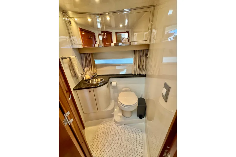 Water Music Yacht Photos Pics Luxurious bathroom in 2006 Carver 43 Motor Yacht with modern fixtures and elegant design.