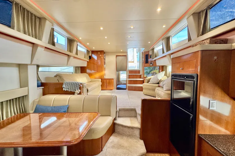 Water Music Yacht Photos Pics Luxurious interior of 2006 Carver 43 Motor Yacht with elegant seating and modern amenities.