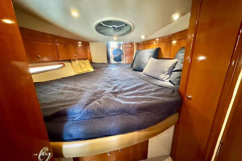 Water Music Yacht Photos Pics Luxurious cabin interior of 2006 Carver 43 Motor Yacht with plush bedding.