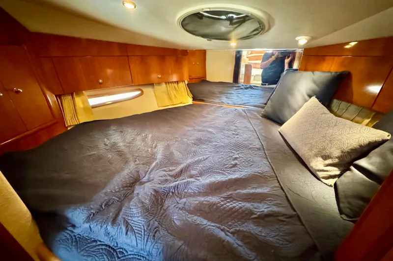 Water Music Yacht Photos Pics Luxurious cabin interior of 2006 Carver 43 Motor Yacht with cozy bedding.