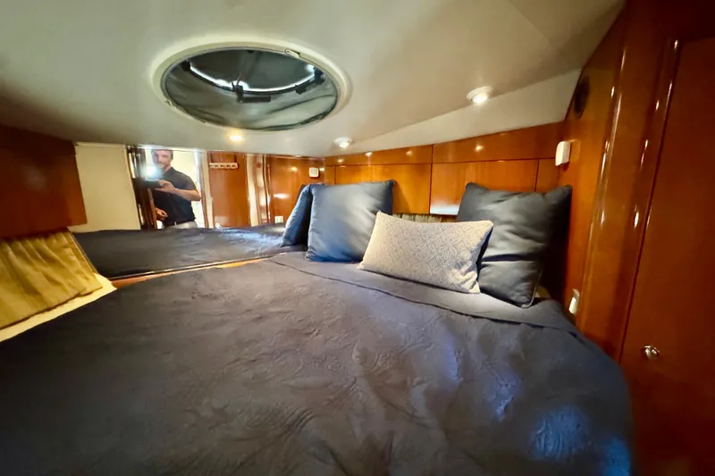 Water Music Yacht Photos Pics Luxurious cabin interior of 2006 Carver 43 Motor Yacht with plush bedding.