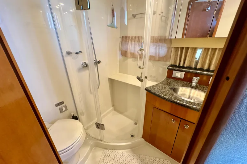 Water Music Yacht Photos Pics Luxurious bathroom in 2006 Carver 43 Motor Yacht with shower and sink.