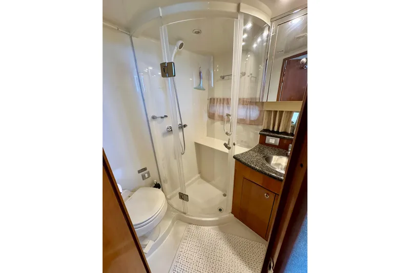 Water Music Yacht Photos Pics Luxurious bathroom in 2006 Carver 43 Motor Yacht with shower and sink.