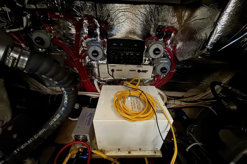 Water Music Yacht Photos Pics Engine room of 2006 Carver 43 Motor Yacht with wiring and equipment.