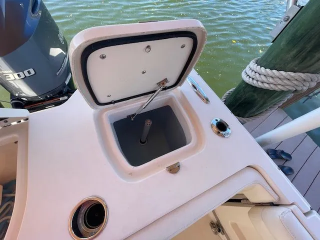  Yacht Photos Pics Grady-White 325 Freedom 2021 boat with open storage compartment lid.