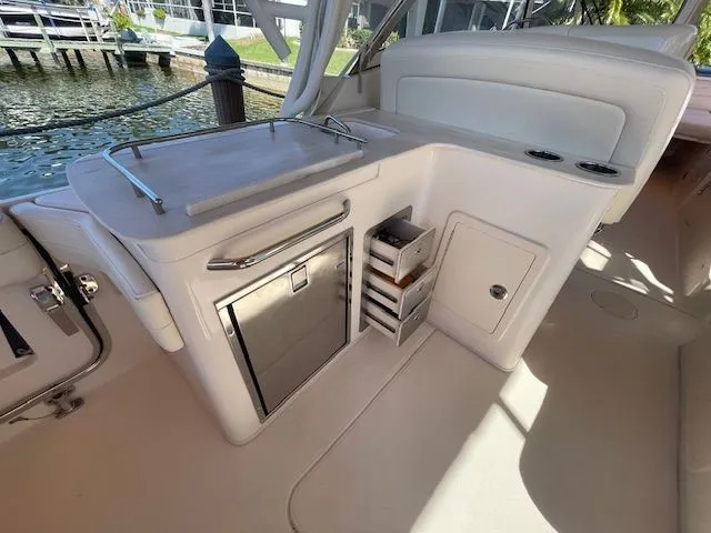  Yacht Photos Pics Interior of 2021 Grady-White 325 Freedom with fridge and storage.
