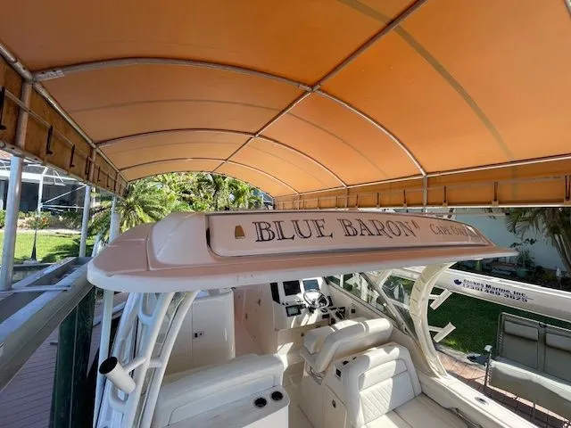  Yacht Photos Pics Grady-White 325 Freedom boat under orange canopy, 2021 model.