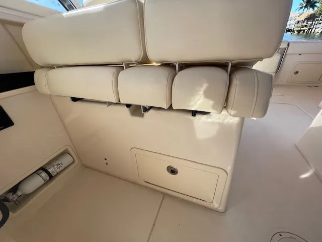  Yacht Photos Pics Interior of Grady-White 325 Freedom boat, seating area and storage.