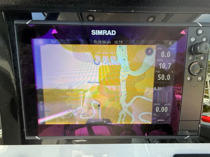 Yacht Photos Pics Simrad navigation display on 2024 Sea Pro 262DLX showing Edisto Island map and boat metrics.