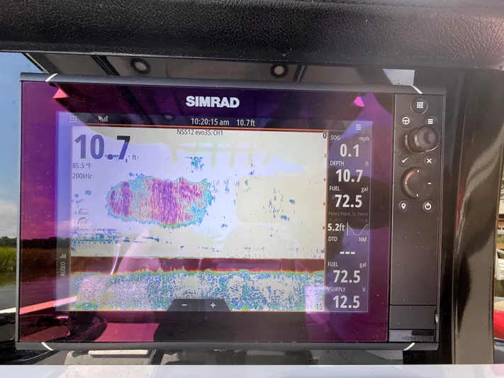  Yacht Photos Pics Simrad fishfinder display on 2024 Sea Pro 262DLX boat, showing depth and sonar data.