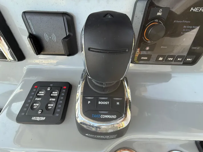  Yacht Photos Pics 2024 Sea Pro 262DLX boat control panel with joystick and audio system.