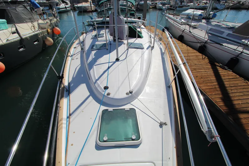  Yacht Photos Pics 2001 Beneteau Oceanis 461 sailboat docked at marina, top deck view.