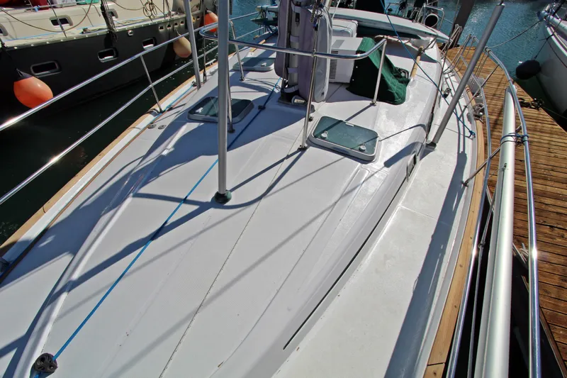  Yacht Photos Pics 2001 Beneteau Oceanis 461 sailboat deck view at marina.