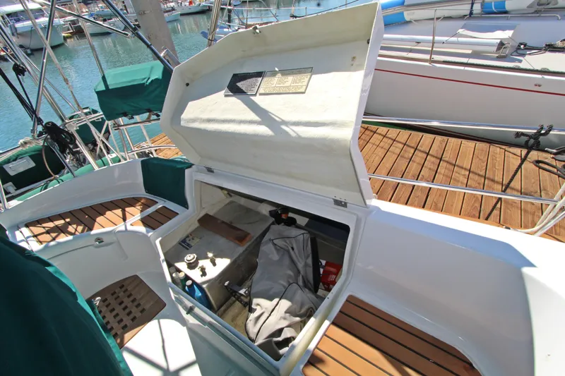  Yacht Photos Pics Open storage compartment on 2001 Beneteau Oceanis 461 sailboat, docked at marina.