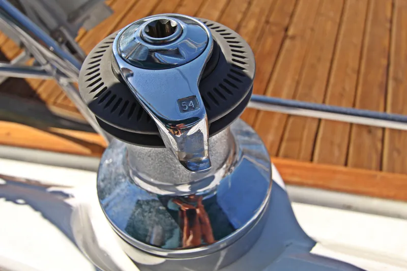  Yacht Photos Pics Winch on 2001 Beneteau Oceanis 461 sailboat deck, close-up view.