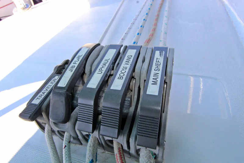  Yacht Photos Pics Sailing controls on a 2001 Beneteau Oceanis 461 yacht, featuring labeled levers and ropes.