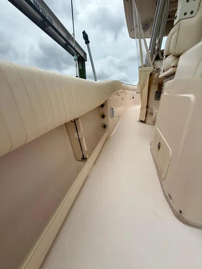  Yacht Photos Pics 2008 Grady-White Canyon 336 boat interior with cushioned seating and storage compartments.