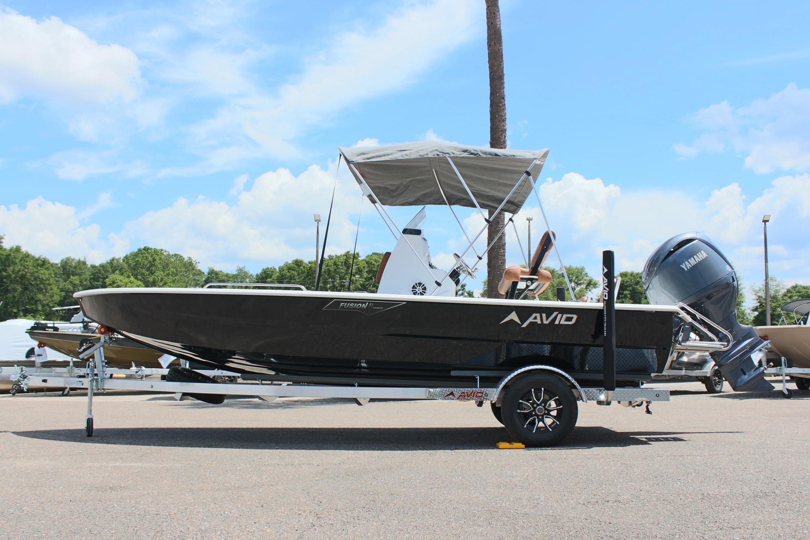 2024 Avid 21 Fusion boat on trailer with Yamaha outboard motor.