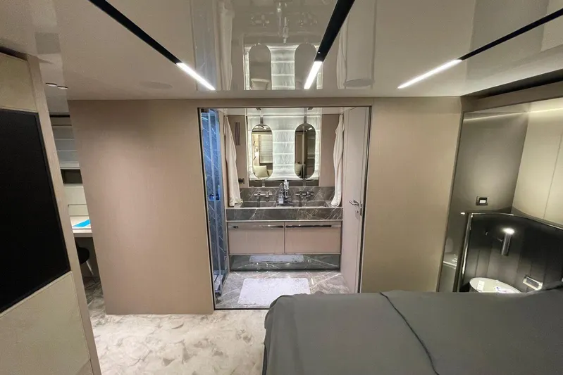  Yacht Photos Pics Luxurious interior of 2024 Cranchi 67 Sessantasette Fly yacht with modern bathroom design.