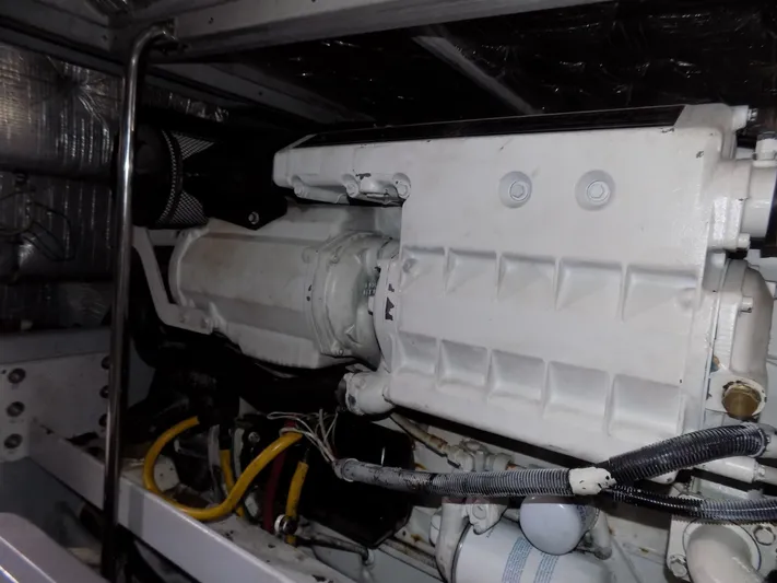  Yacht Photos Pics Engine compartment of a 2005 Silverton 43 Motor Yacht, showcasing mechanical components and wiring.