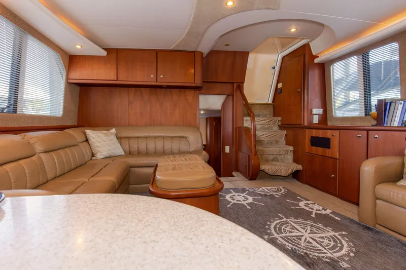  Yacht Photos Pics Interior of 2005 Silverton 43 Motor Yacht with luxurious seating and nautical decor.