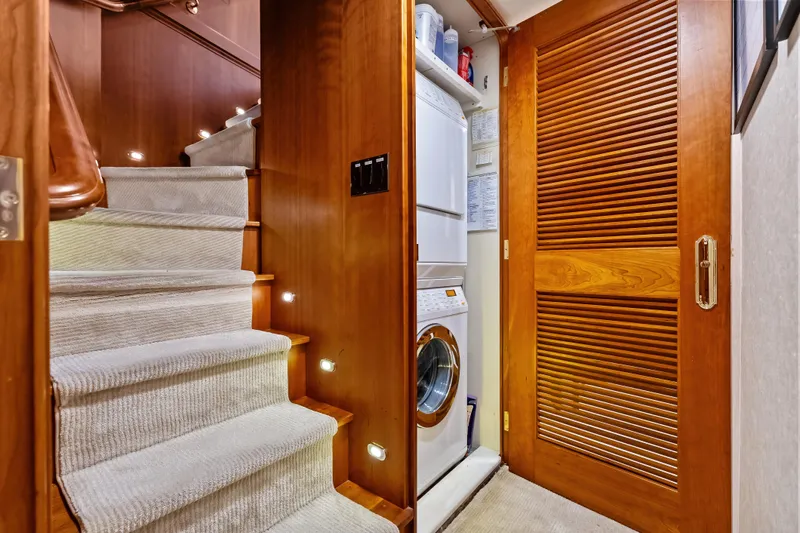Silver Seas Yacht Photos Pics Staircase and laundry area inside a 1998 Burger Raised Pilothouse yacht.