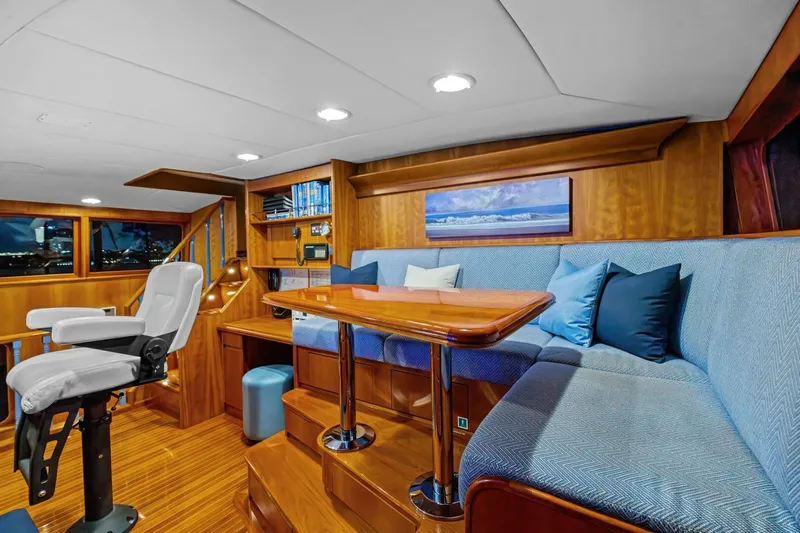 Silver Seas Yacht Photos Pics Luxurious interior of a 1998 Burger Raised Pilothouse yacht with elegant wood finishes.