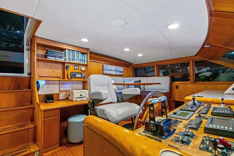 Silver Seas Yacht Photos Pics Luxurious 1998 Burger Raised Pilothouse yacht interior with navigation controls and seating.
