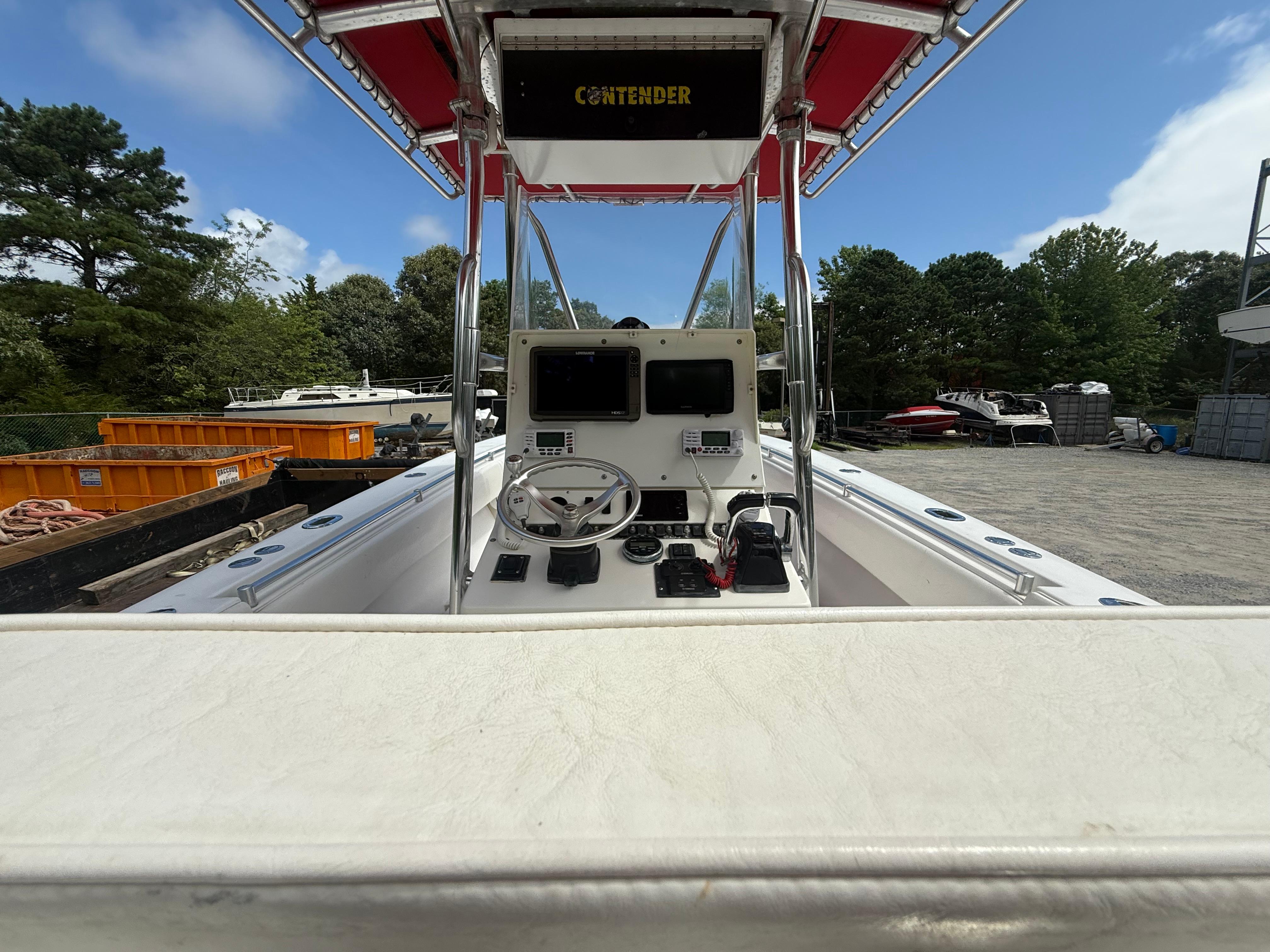 2002 Contender 27 Tournament boat interior with steering console and navigation equipment.