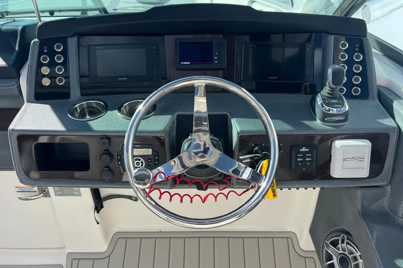  Yacht Photos Pics Dashboard of 2020 Chaparral 280 OSX boat with steering wheel and controls.