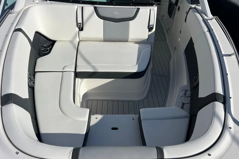  Yacht Photos Pics 2020 Chaparral 280 OSX boat interior with white and gray seating arrangement.