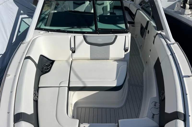  Yacht Photos Pics 2020 Chaparral 280 OSX boat interior with white seating and modern design.